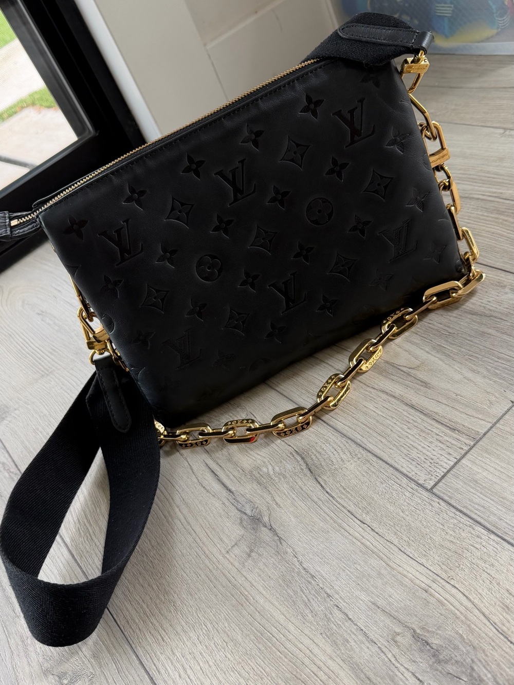 Louis Vuitton Black Monogram Embossed Crossbody with Gold Chain Strap